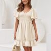 61QBkOpdd0L.jpg Women's Flowy Casual Mini Dresses 2025 Summer Graduation Smocked V Neck Vacation Dress Dress with Pockets